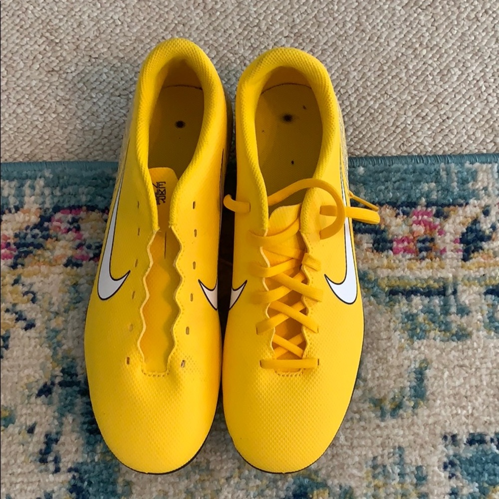 Yellow soccer cleats